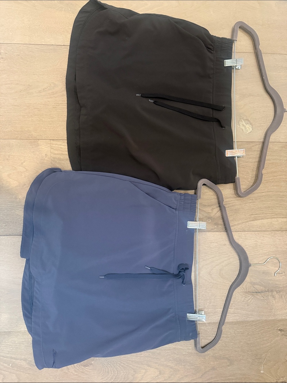 Woman’s golf Athletic skirts - Black and Navy size medium LIKE NEW Sold as a Set